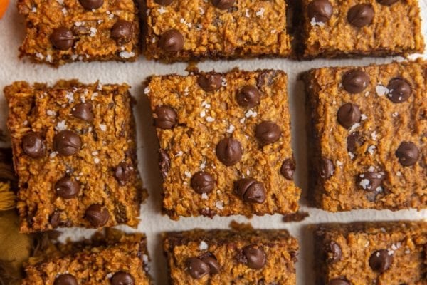 horizontal photo of pumpkin oatmeal bars sliced into squares