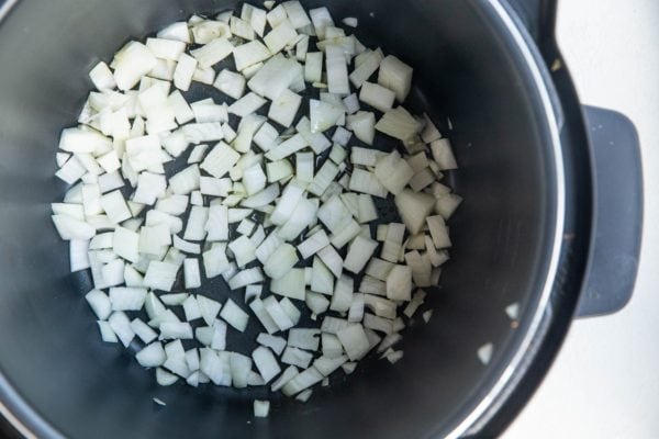 Onion sautéing in an Instant Pot to make soup