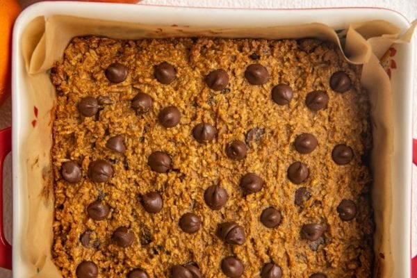 Pumpkin bars fresh out of the oven in a baking pan.