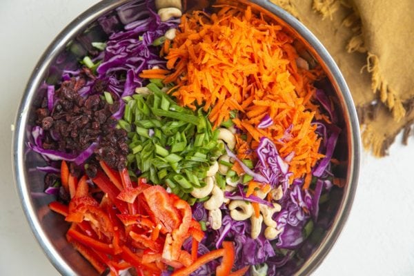 Mixing bowl with salad ingredients inside