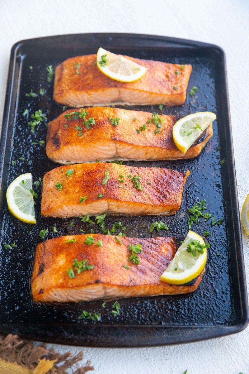 Sheet pan of broiled salmon, fresh out of the oven, ready to serve.