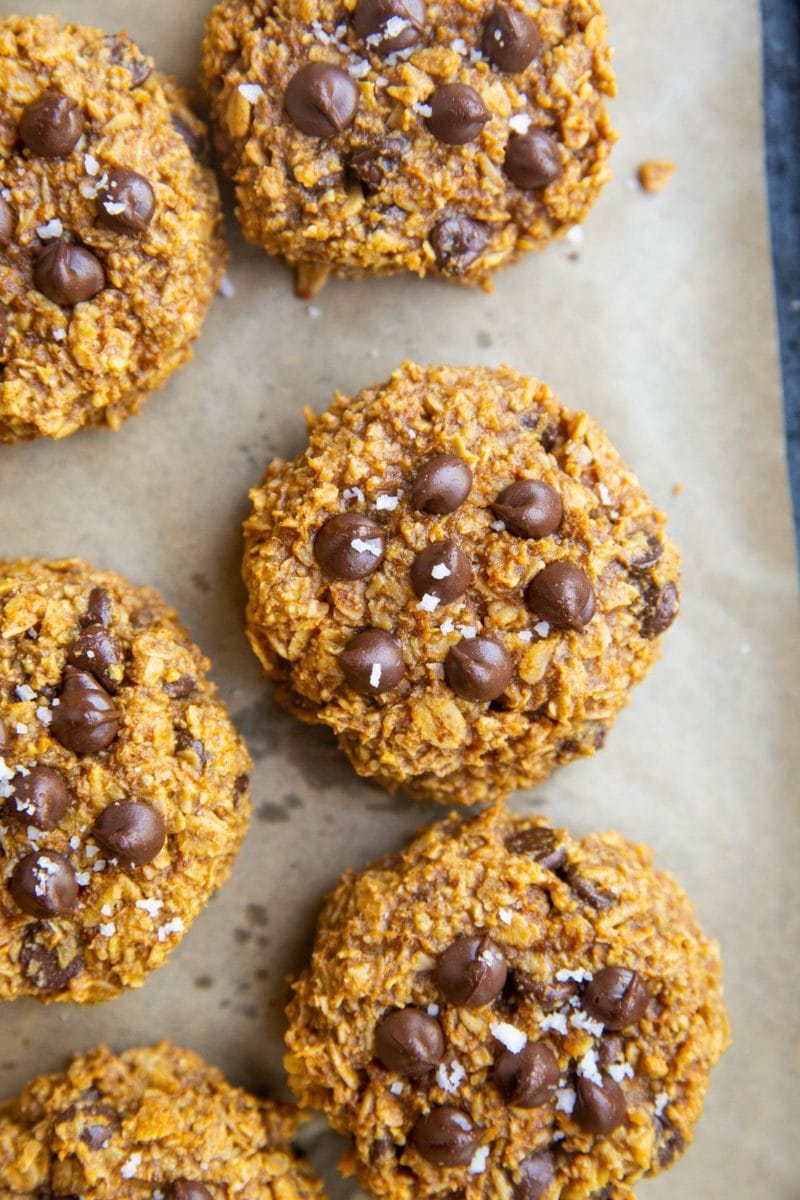 Baking sheet of delicious healthy Vegan Pumpkin Oatmeal Cookies that are flourless, egg-free, dairy-free, refined sugar-free, and made with just 5 basic ingredients.
