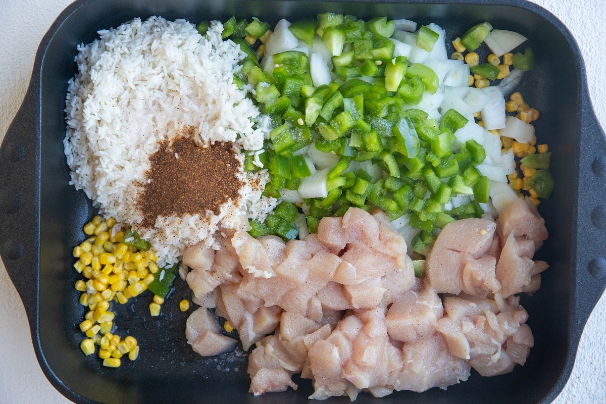 Ingredients for chicken casserole in a casserole dish