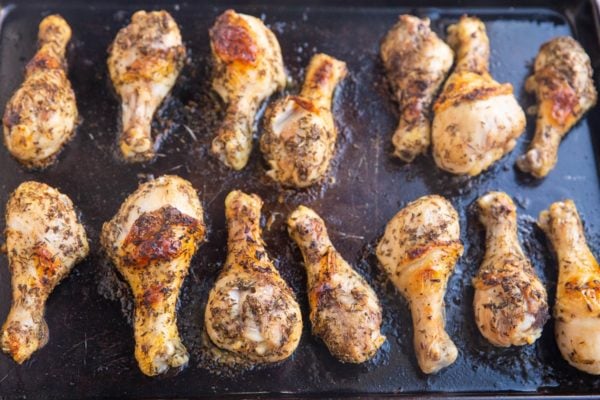 Crispy chicken drumsticks fresh out of the oven.