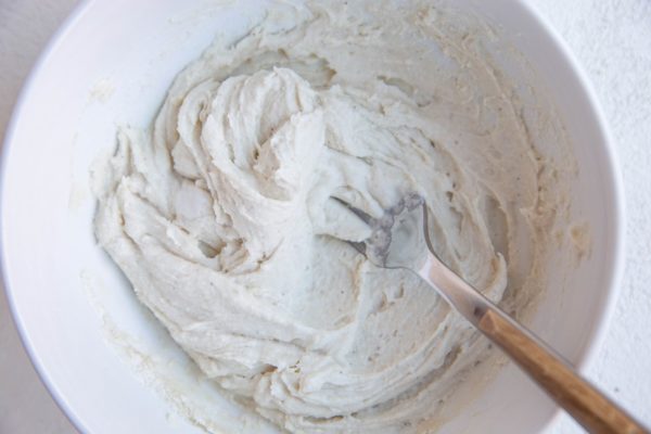 Cinnamon roll dough in a bowl.