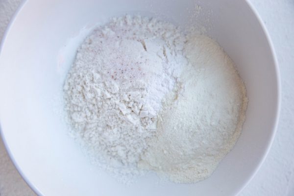 Dry ingredients for cinnamon roll in a bowl.
