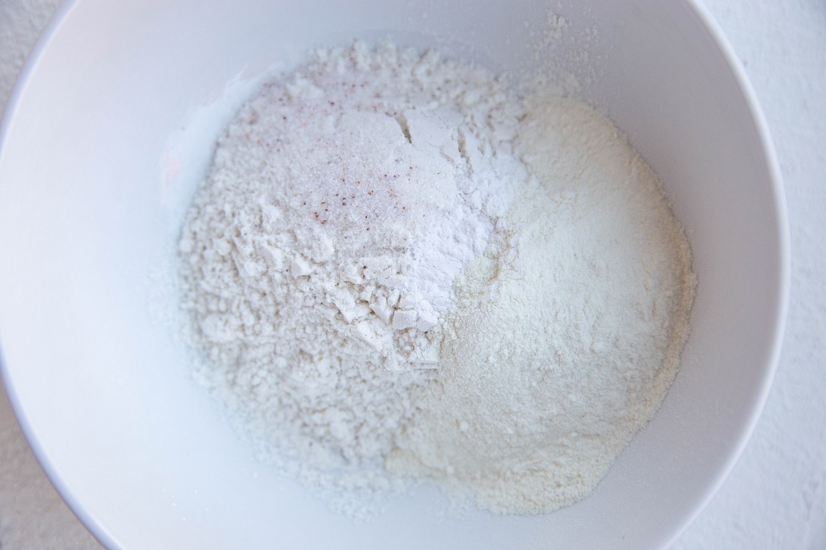 Dry ingredients for cinnamon roll in a bowl.