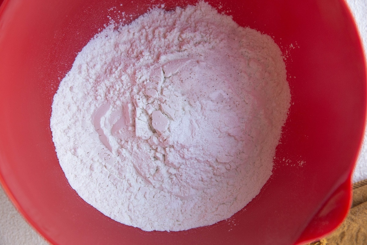 large bowl with dry ingredients for apple bread.