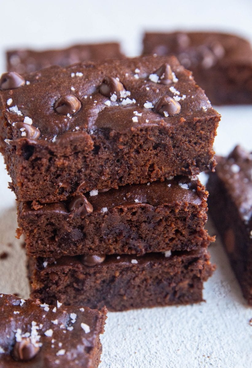 Stack of sweet potato brownies sprinkled with sea salt.