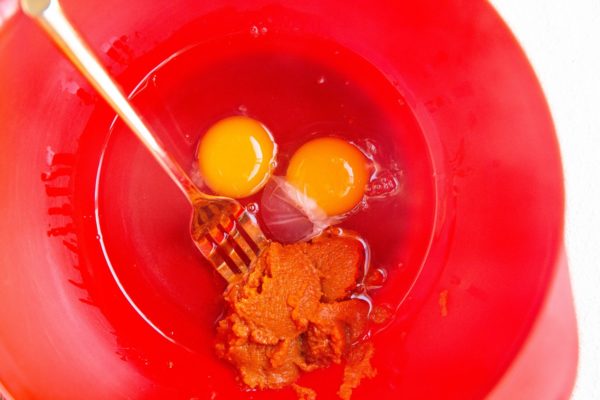 Wet ingredients for the cookies in a mixing bowl, ready to be mixed.