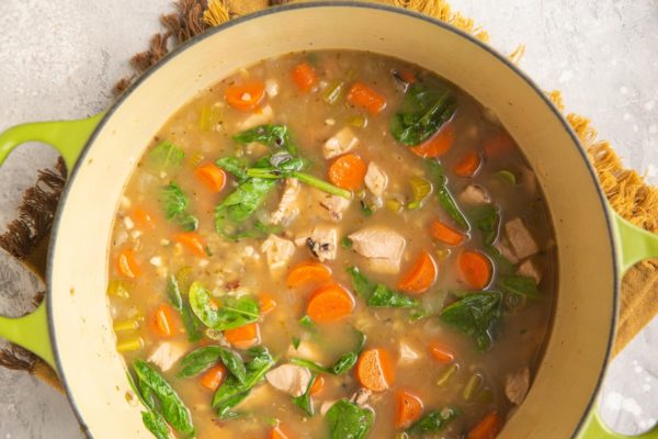 Finished pot of chicken soup with wild rice.