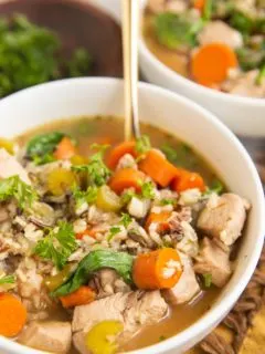 Two bowls of wild rice chicken soup.