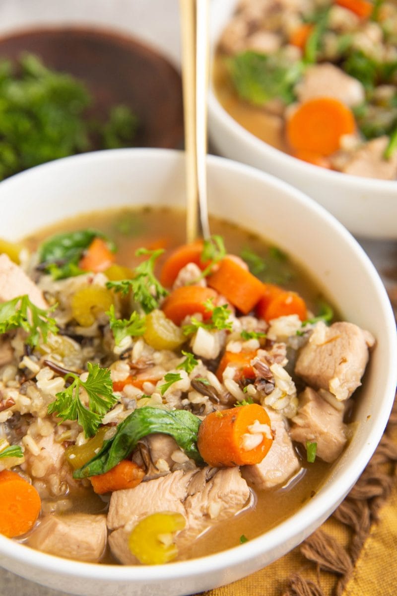 Two bowls of wild rice chicken soup.