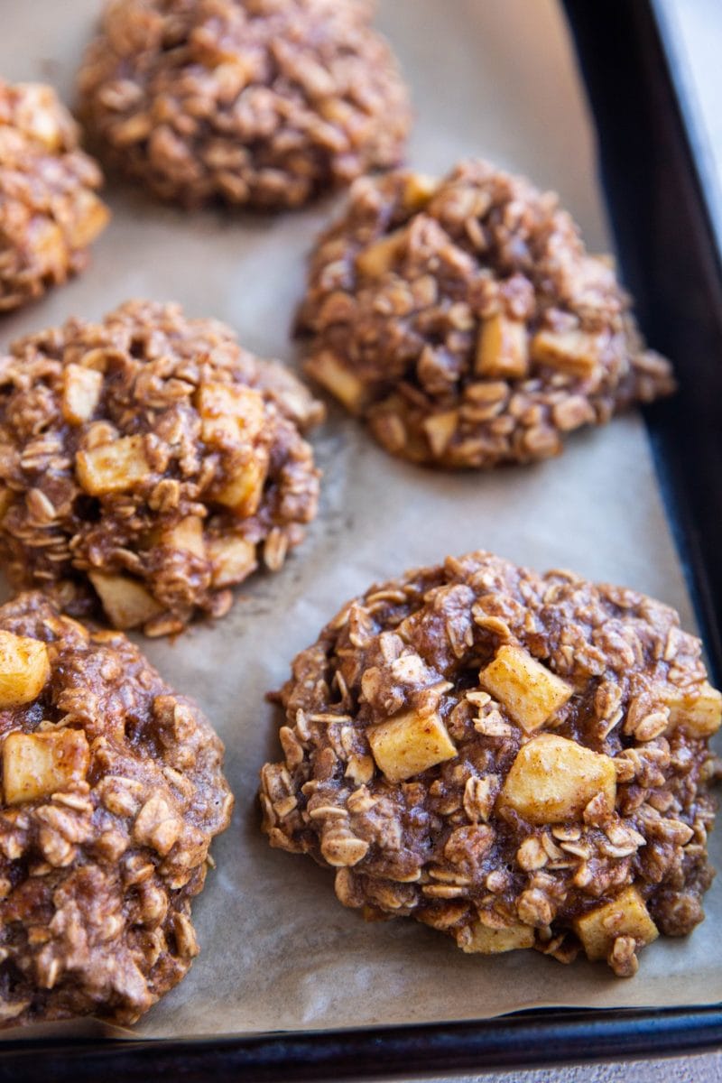 Cookie sheet with freshly baked apple cinnamon cookies on it