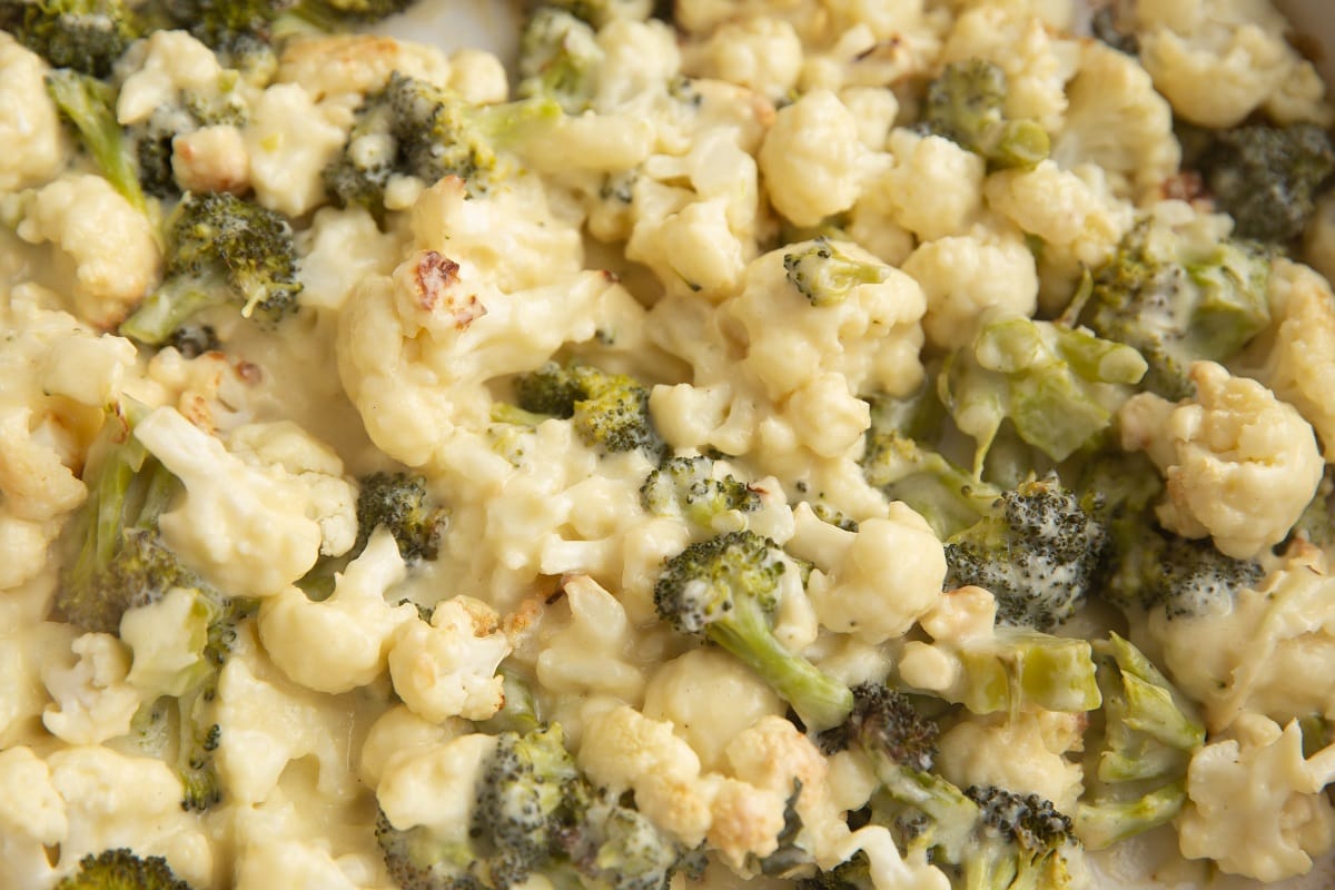 Roasted broccoli and cauliflower with sauce mixed in.