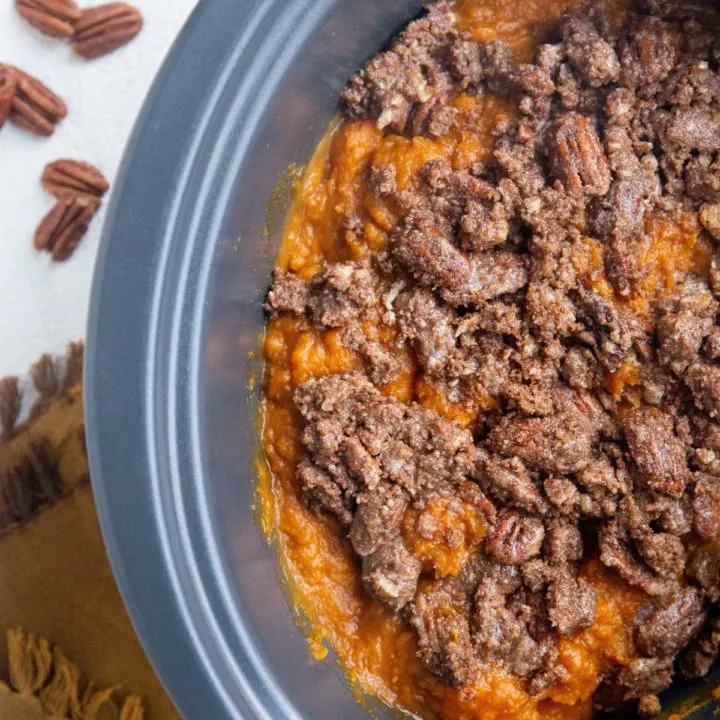 Top down photo of whole crock pot with slow cooker sweet potato casserole inside.