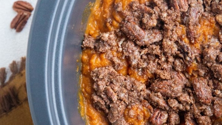Top down photo of whole crock pot with slow cooker sweet potato casserole inside.