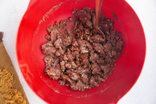 Ingredients for the sweet potato casserole topping mixed up in a mixing bowl.