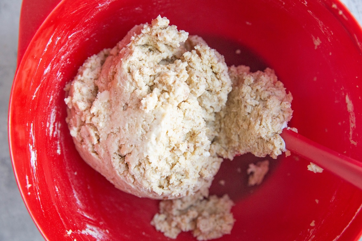 Cinnamon roll dough in a mixing bowl