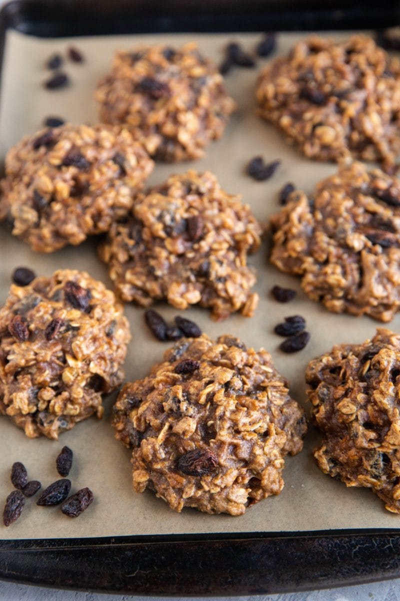 Baking sheet of healthy oatmeal raisin cookies.