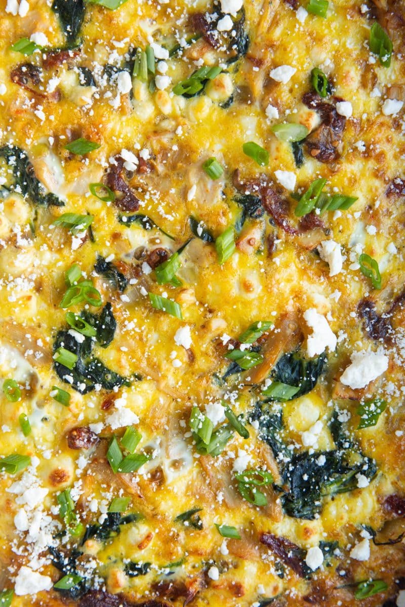 Close up image of leftover turkey breakfast casserole so you can see all of the ingredients.