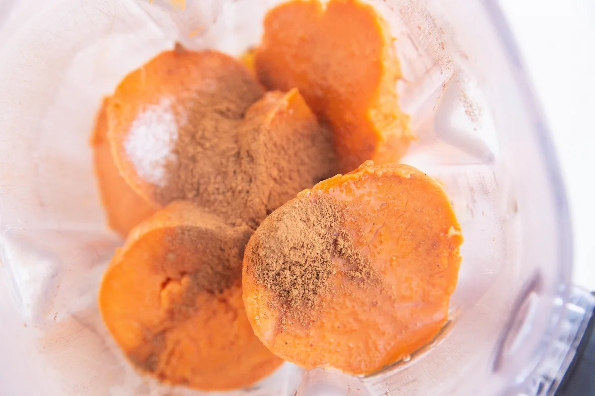 sweet potatoes in a blender with coconut milk, eggs, salt and cinnamon