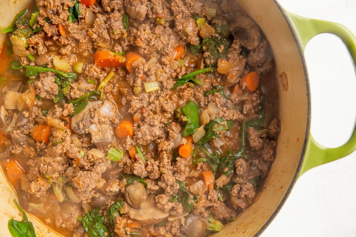 Spinach added into the meat mixture.