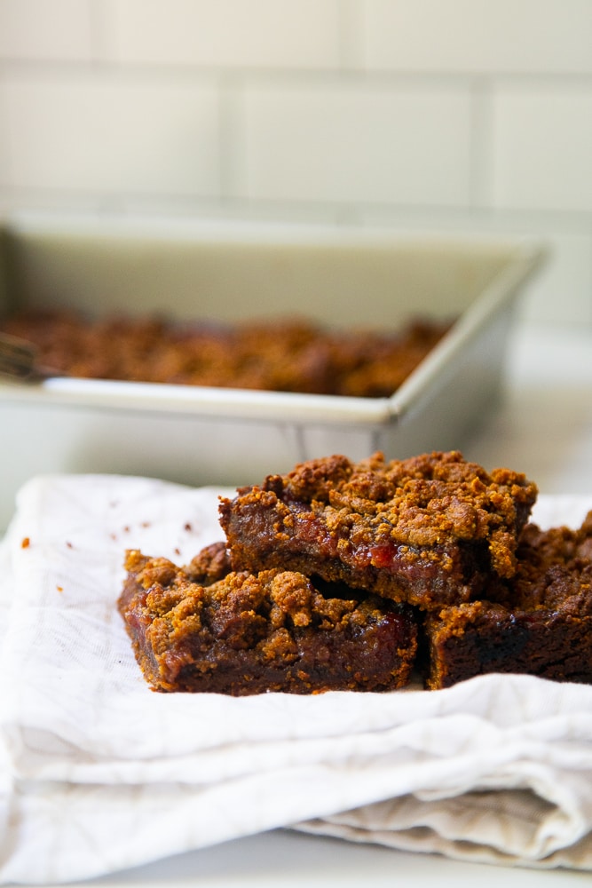 Grain-Free Peanut Butter & Jelly Bars on a napkin, fresh out of the oven.