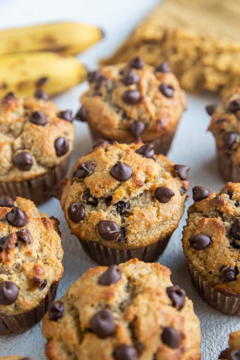 Banana Muffins sitting on a white backdrop.