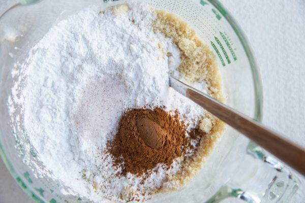 Mixing bowl of almond flour, tapioca flour, cinnamon and salt, ready to mix together.