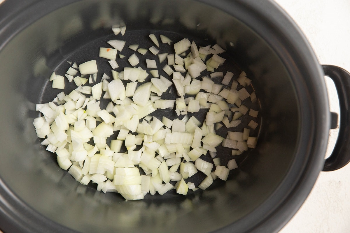 Onion in a crock pot to make shredded beef