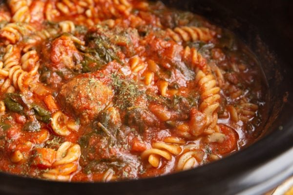 Close up horizontal image of crock pot meatball soup.