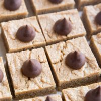 Angled shot of peanut butter chocolate blossom cookies.