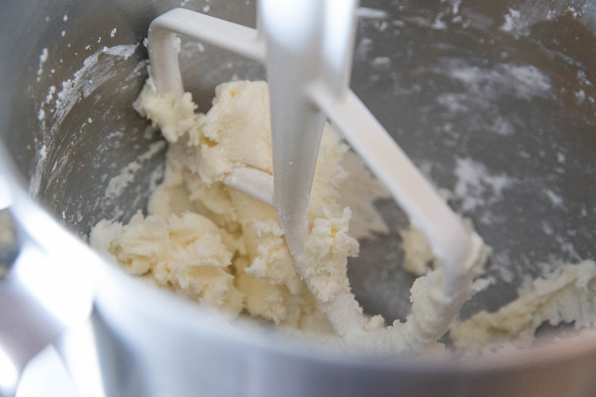 Butter and sugar mixed together in a stand mixer.