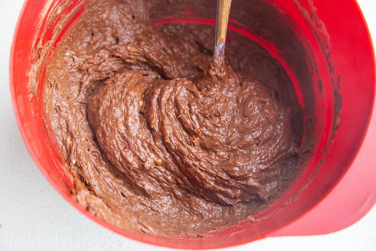 Brownie batter in a mixing bowl, ready to be baked.
