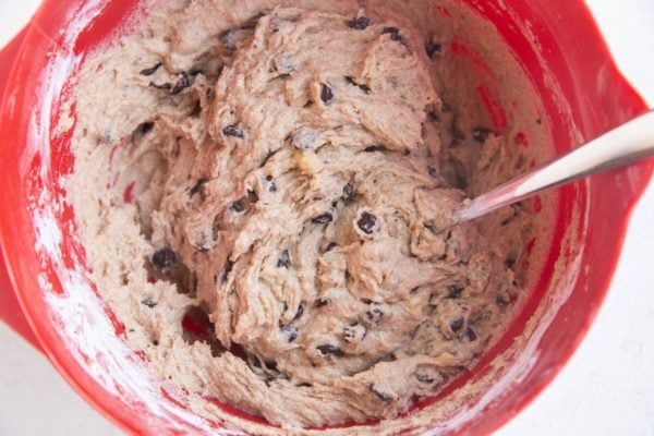 Cassava flour banana bread batter in a mixing bowl, ready to be baked.