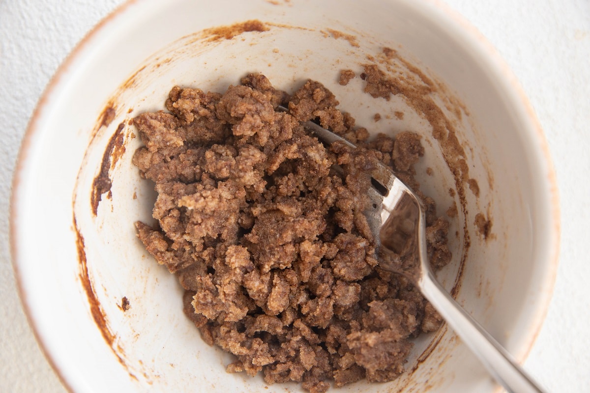 Streusel topping all mixed up in a mixing bowl, ready to be used.