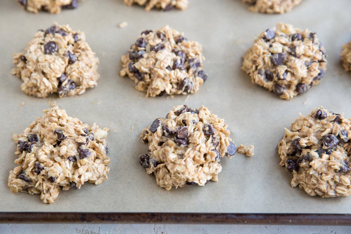 Drop spoonfuls of cookie dough on a baking sheet