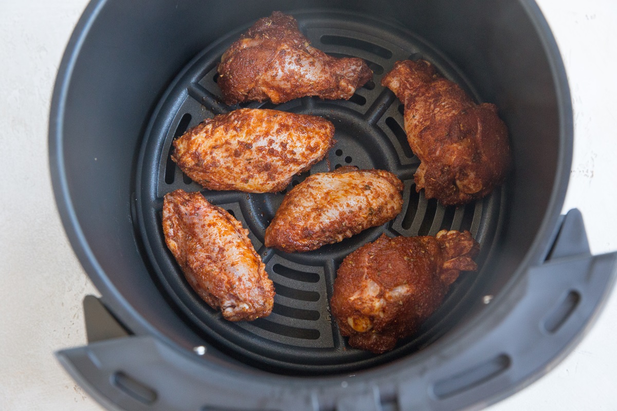 Place chicken wings in the air fryer and make sure they don't touch.