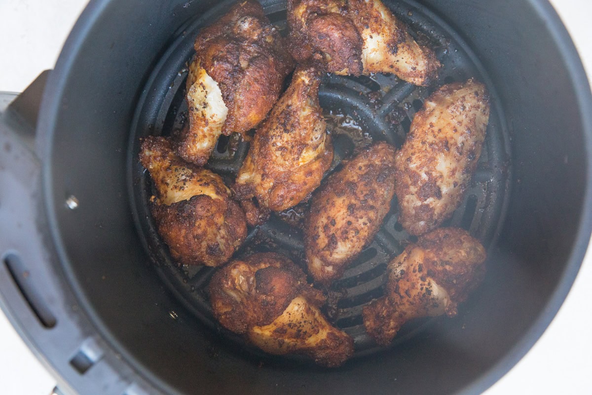 Finished chicken wings in an air fryer