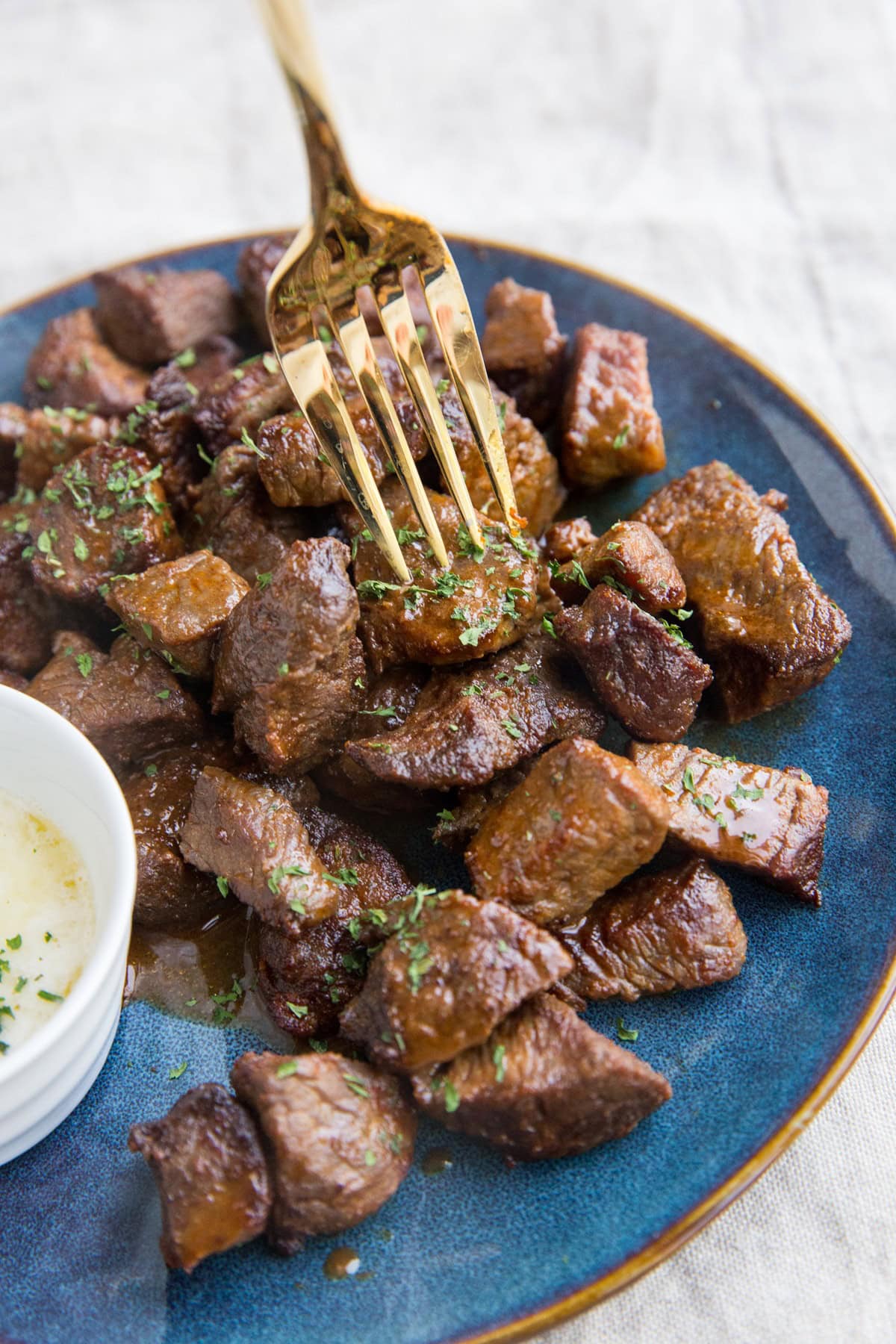 Air Fryer Steak Bites - perfectly cooked steak made in the air fryer! Crispy, flavorful bits of deliciousness. The perfect appetizer recipe!