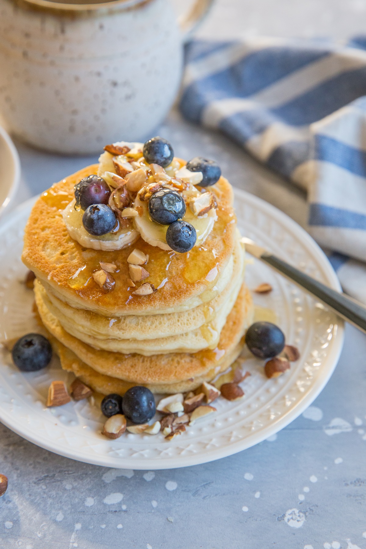 stack of almond flour pancakes with honey drizzle