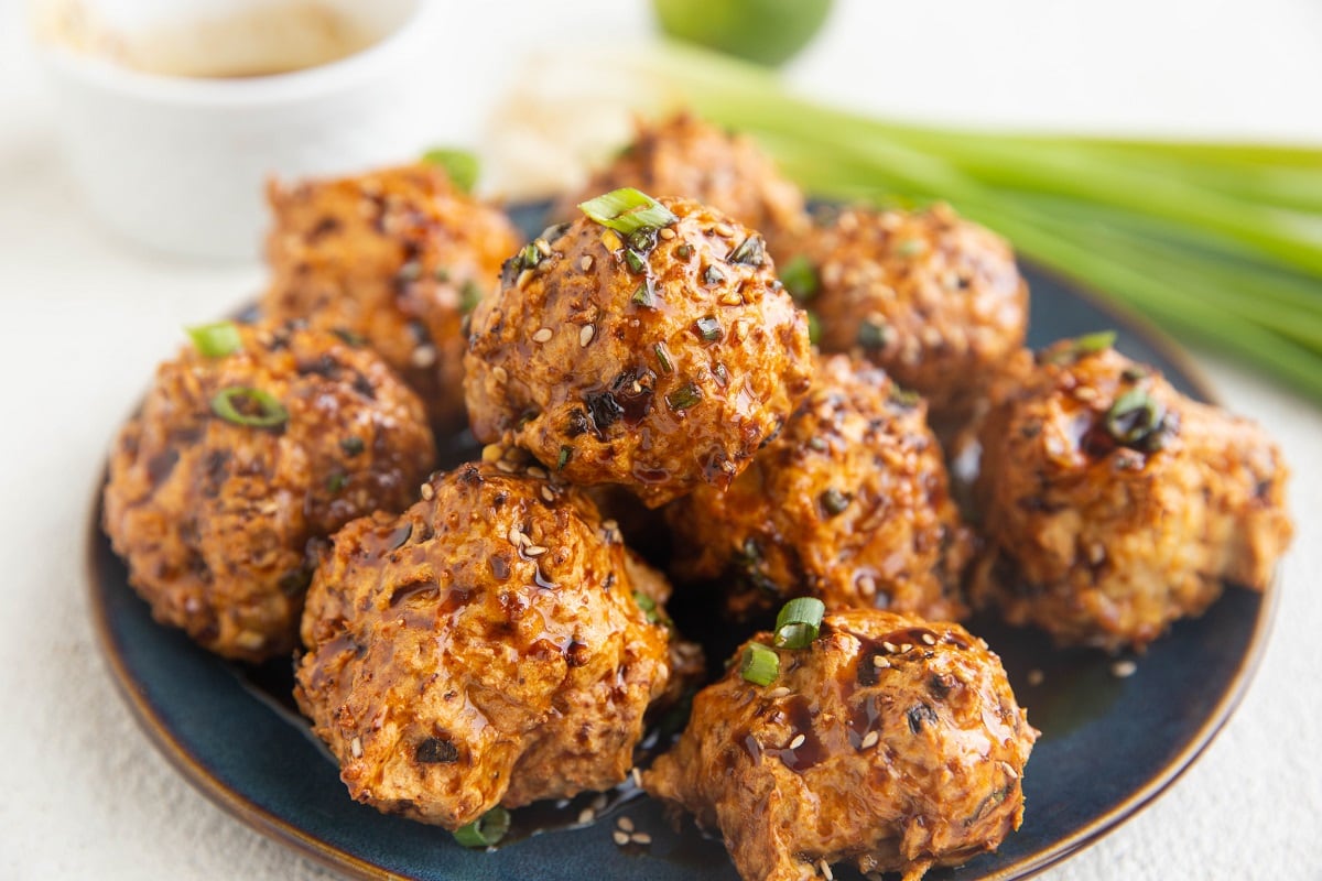 Horizontal photo of plate of turkey meatballs, ready to serve.