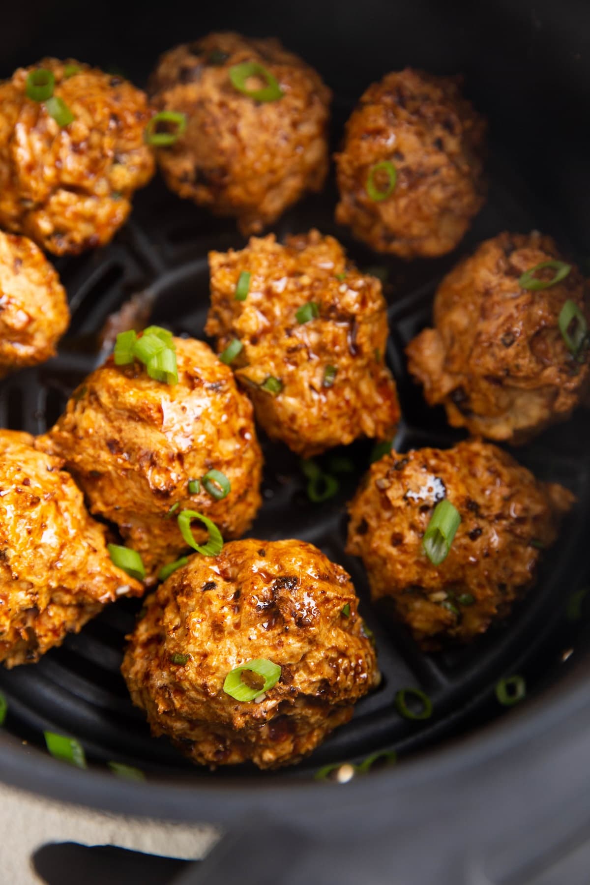 Asian turkey meatballs in an air fryer.