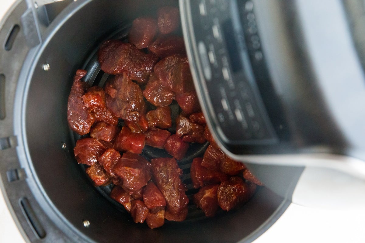 Transfer the steak bites to the air fryer