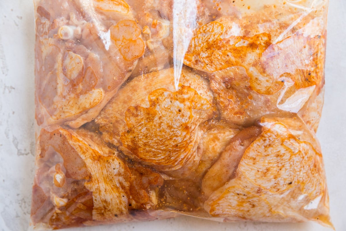 Marinated chicken thighs in a zip lock bag