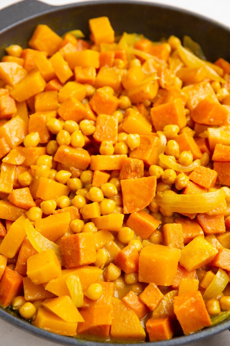 Skillet with butternut squash and yam curry. Finished and ready to serve.