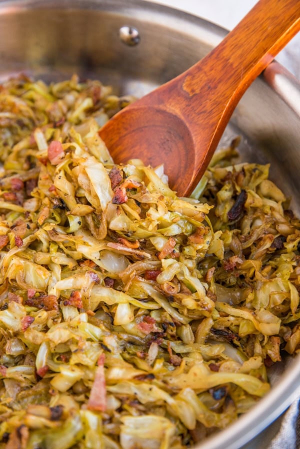 Caramelized Cabbage and Bacon - an easy vegetable side dish with cabbage, onions, garlic, and bacon! Use it as a side, or even as a condiment, like caramelized onions