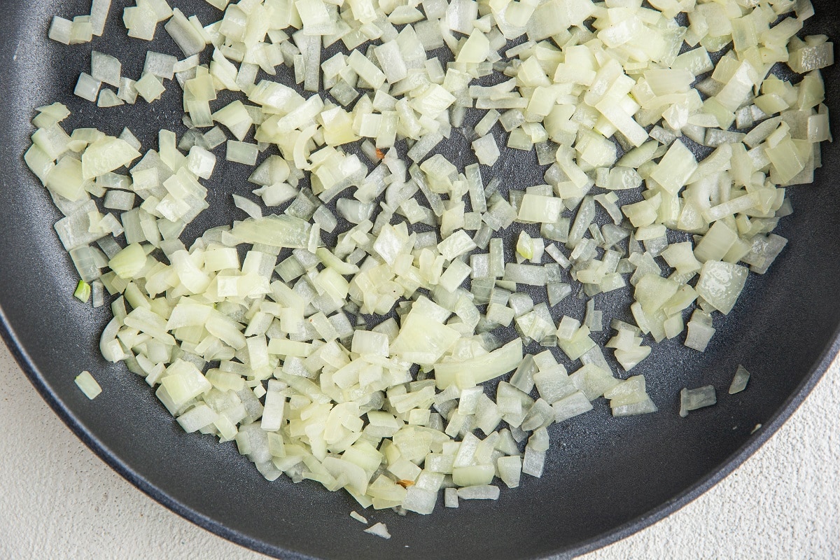 Onions sautéing in a skillet