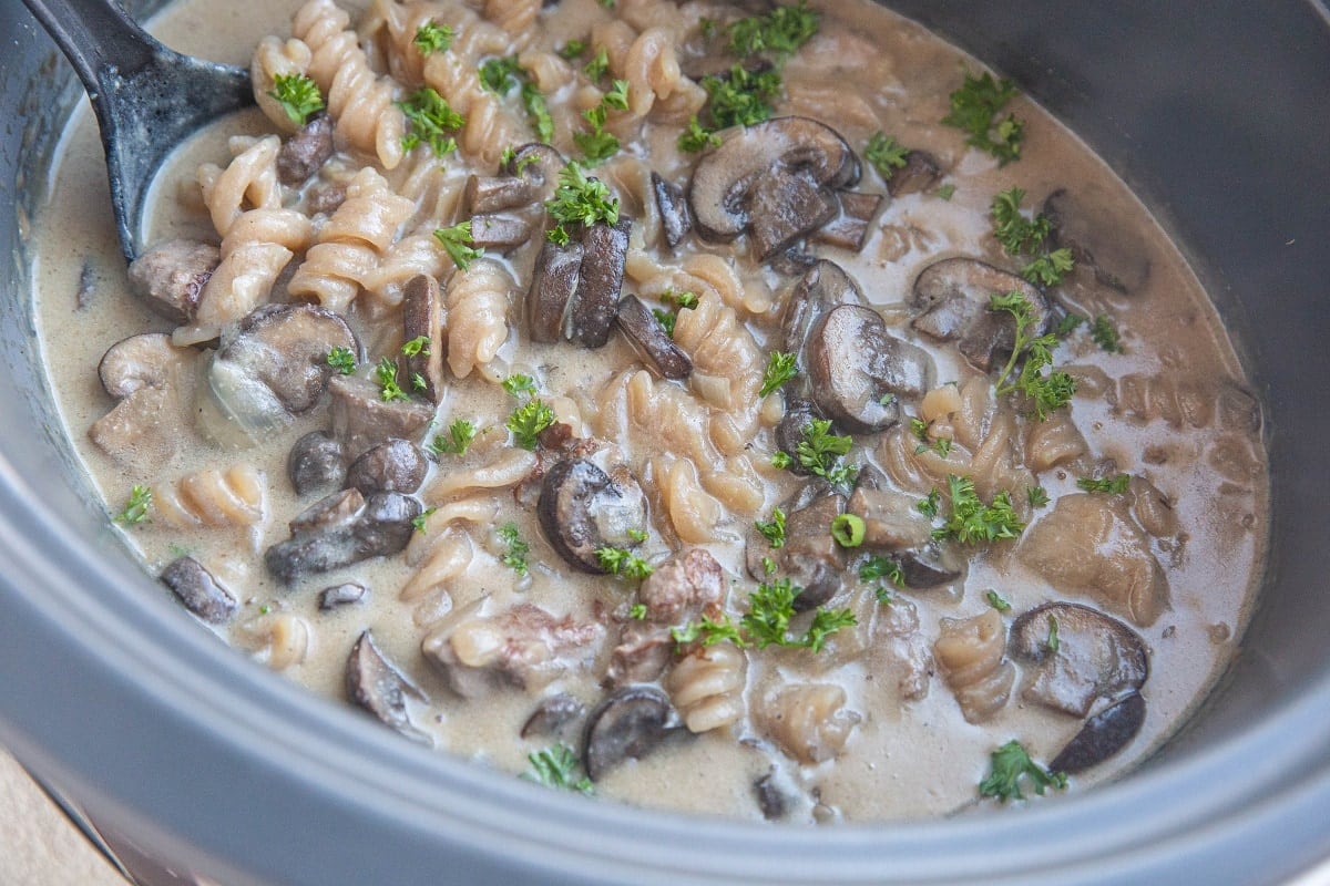 Finished beef stroganoff in a slow cooker, ready to serve.